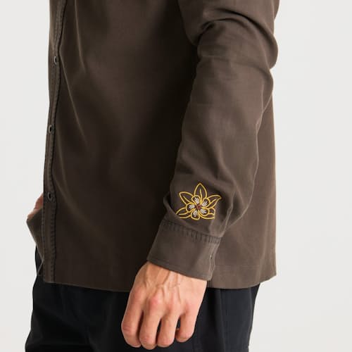 on model image of Guacho Range Shirt