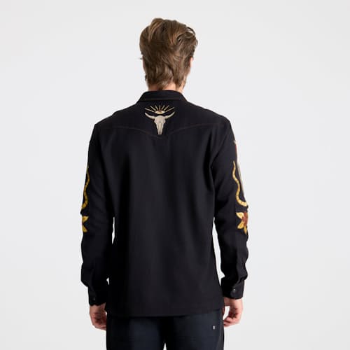 on model image of Guacho Range Shirt