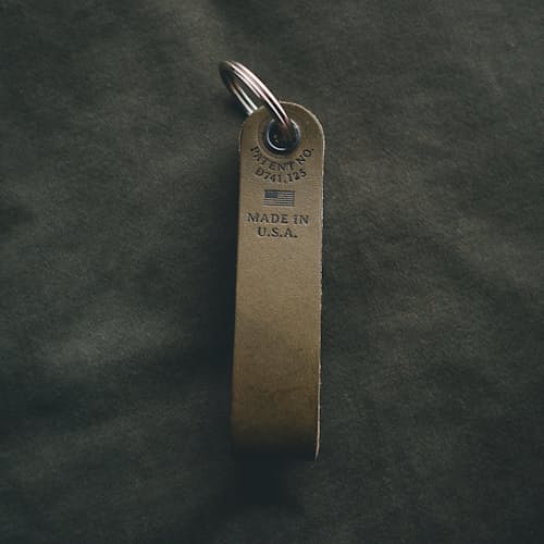 lifestyle image of Snake Bite Keychain Bottle Opener