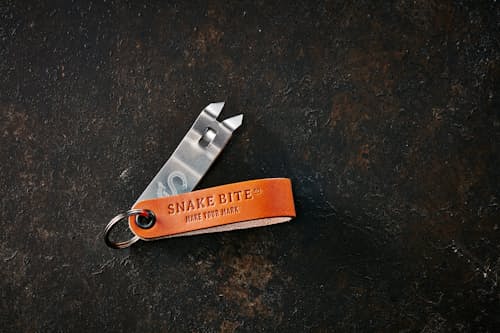 lifestyle image of Snake Bite Keychain Bottle Opener