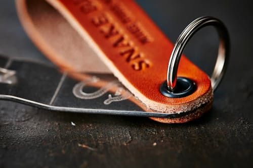 lifestyle image of Snake Bite Keychain Bottle Opener