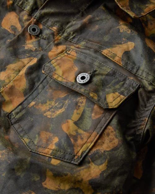 laydown detail image of Flannel-Lined Waxed Trucker Jacket