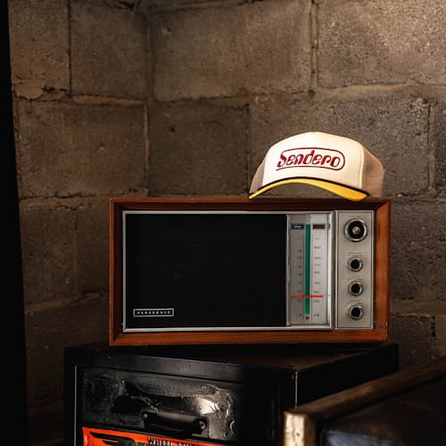 lifestyle image of Retrocade Foam Trucker Hat