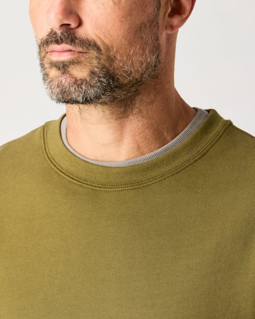 lifestyle image of 10-Year Crewneck Sweatshirt