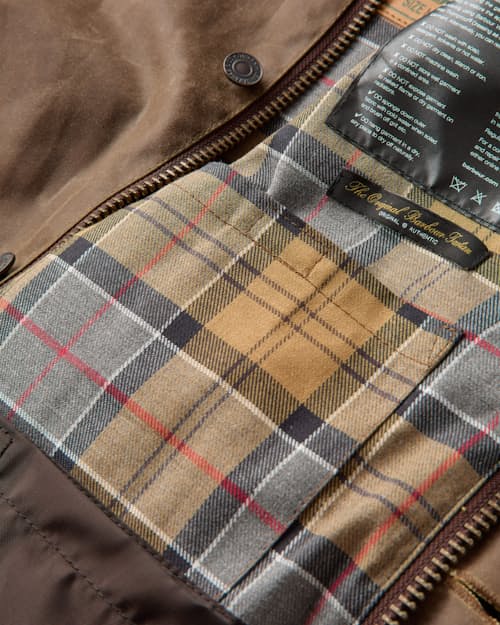 laydown detail image of Barbour x Levi's Spey Waxed Jacket