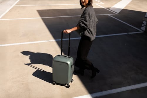 lifestyle image of Transit Carry-On Luggage Plus