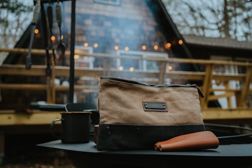 lifestyle image of Neelum Large Zipper Pouch - Khaki