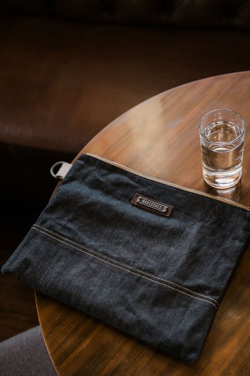 lifestyle image of Neelum Large Zipper Pouch - Denim