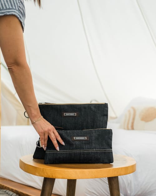 lifestyle image of Neelum Small Zipper Pouch - Denim