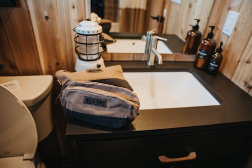 lifestyle image of Neelum 3L Dopp Kit - Khaki