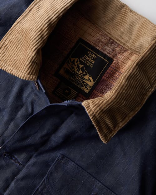 laydown detail image of Flannel-Lined Quilted Waxed Rancher Jacket
