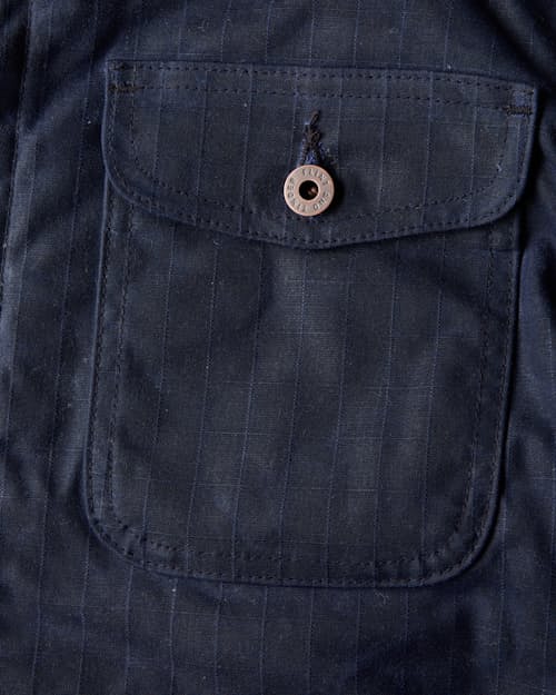 laydown detail image of Flannel-Lined Quilted Waxed Rancher Jacket