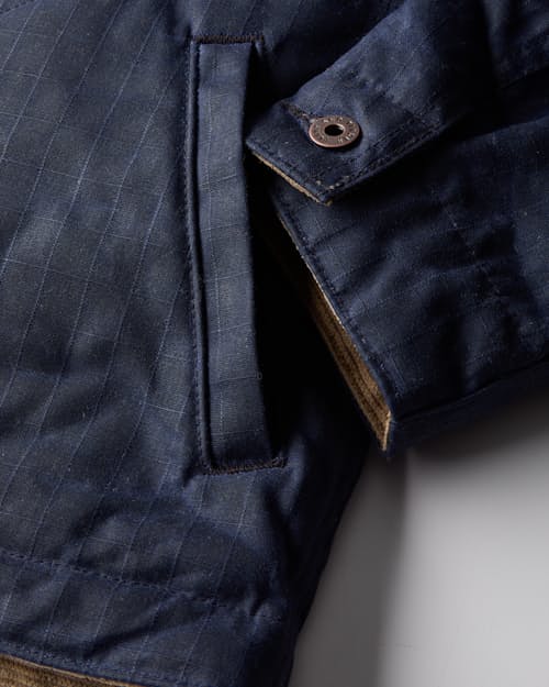 laydown detail image of Flannel-Lined Quilted Waxed Rancher Jacket