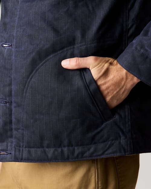 lifestyle image of Flannel-Lined Quilted Waxed Rancher Jacket