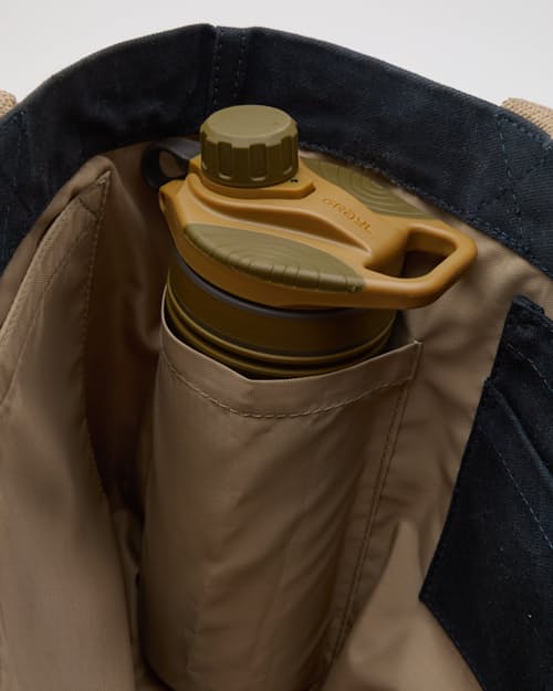 laydown detail image of Coggins Patch Waxed Canvas Tote