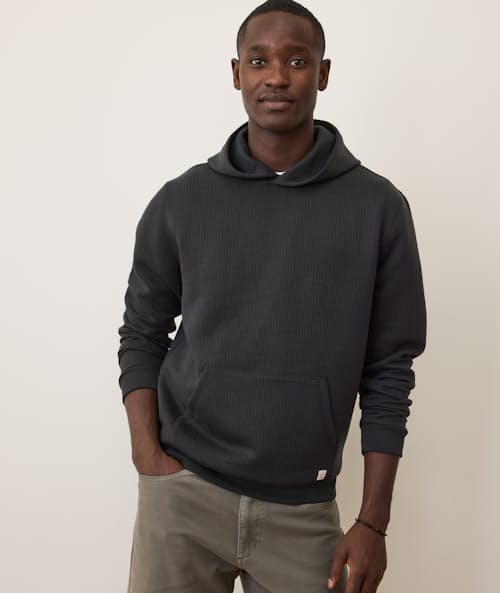 on model image of Corbet Quilted Hoodie