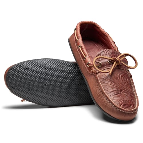 laydown image of Huckberry x Quoddy Coolslide Stamped Leather Slipper