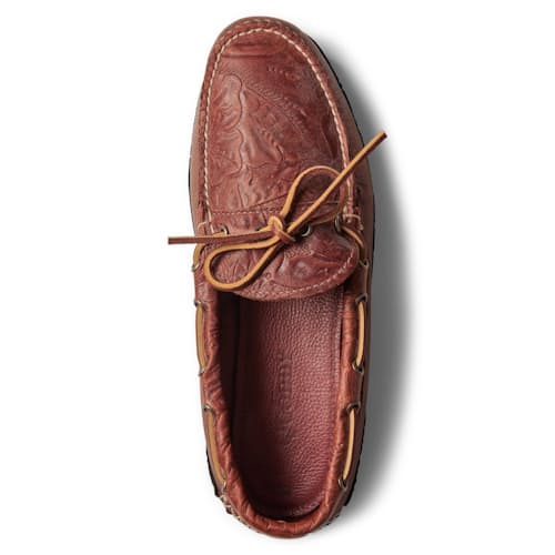 laydown image of Huckberry x Quoddy Coolslide Stamped Leather Slipper