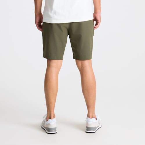 on model image of Layover Pro Traveler Short - 8"