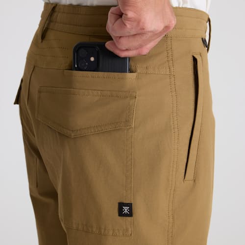 on model image of Layover Pro Traveler Short - 8"