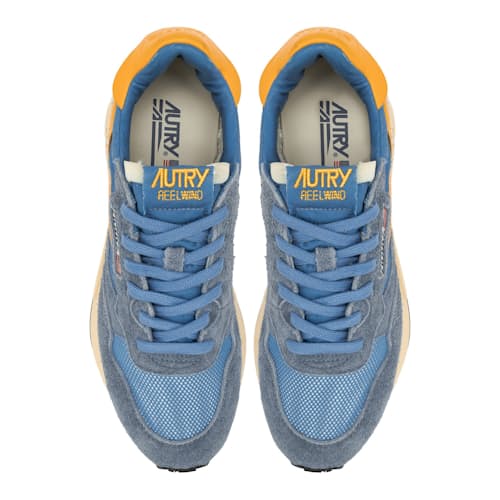 laydown image of Reelwind Sneaker