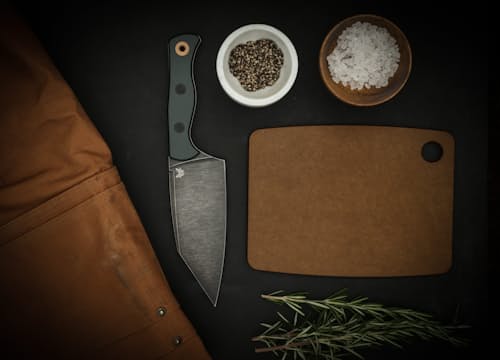 lifestyle image of Station - G10 Chef's Knife