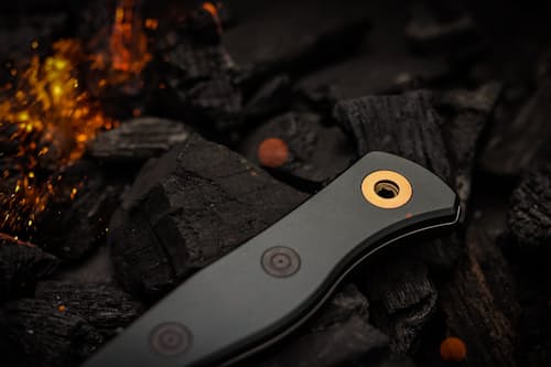lifestyle image of Station - G10 Chef's Knife