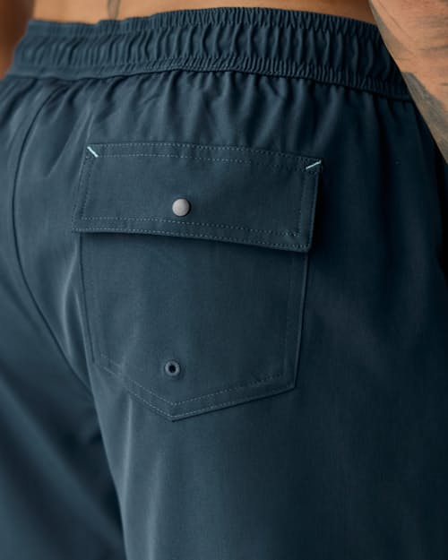 lifestyle image of Performance Lined Swim Trunks - 5"