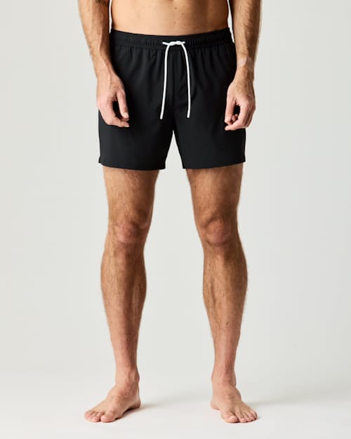 on model image of Performance Lined Swim Trunks - 5"