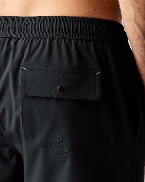 on model image of Performance Lined Swim Trunks - 5"
