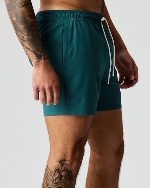 lifestyle image of Performance Lined Swim Trunks - 5"