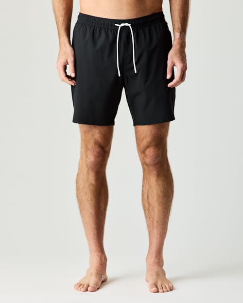 on model image of Performance Lined Swim Trunks - 7"