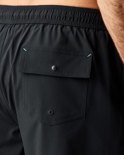 on model image of Performance Lined Swim Trunks - 7"