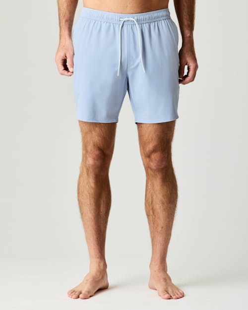 on model image of Performance Lined Swim Trunks - 7"