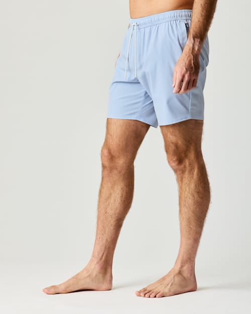 on model image of Performance Lined Swim Trunks - 7"