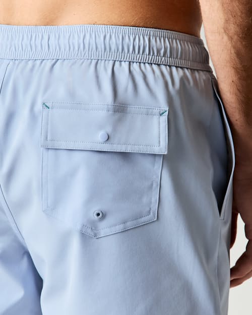 on model image of Performance Lined Swim Trunks - 7"