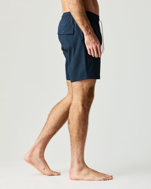 on model image of Performance Lined Swim Trunks - 7"