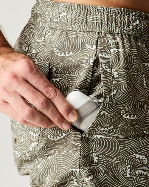 on model image of Performance Lined Swim Trunks - 7"