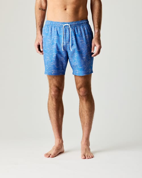 on model image of Performance Lined Swim Trunks - 7"