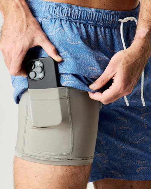 lifestyle image of Performance Lined Swim Trunks - 7"