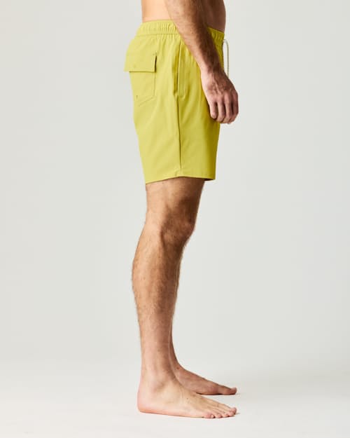 on model image of Performance Lined Swim Trunks - 7"