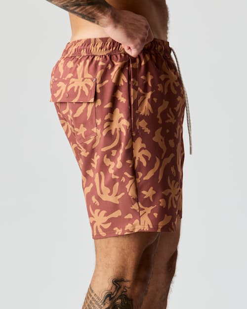 lifestyle image of Performance Lined Swim Trunks - 7"