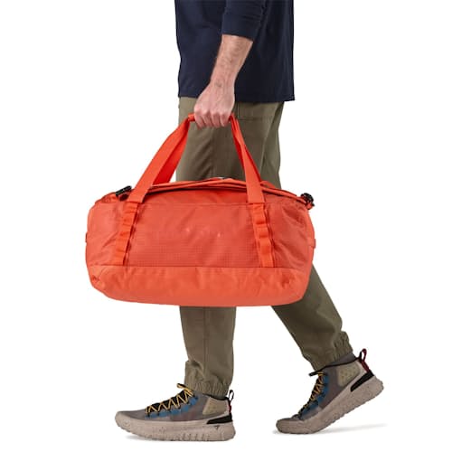 on model image of Black Hole Duffel Bag - 40L