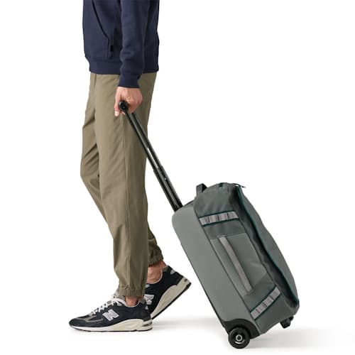 on model image of Black Hole Wheeled Duffel 40L