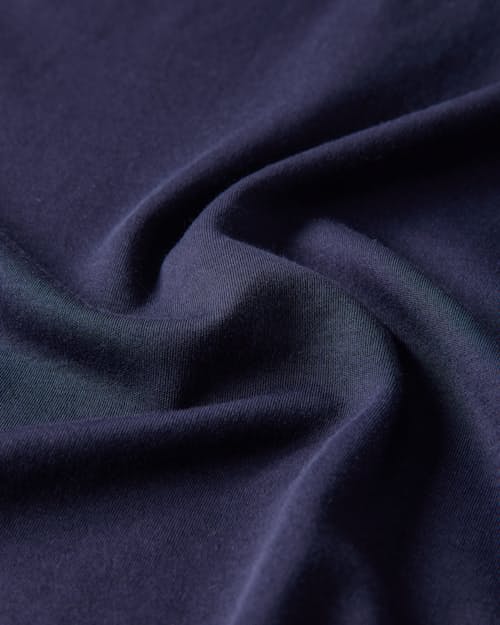 laydown detail image of AloeKnit Polo Shirt