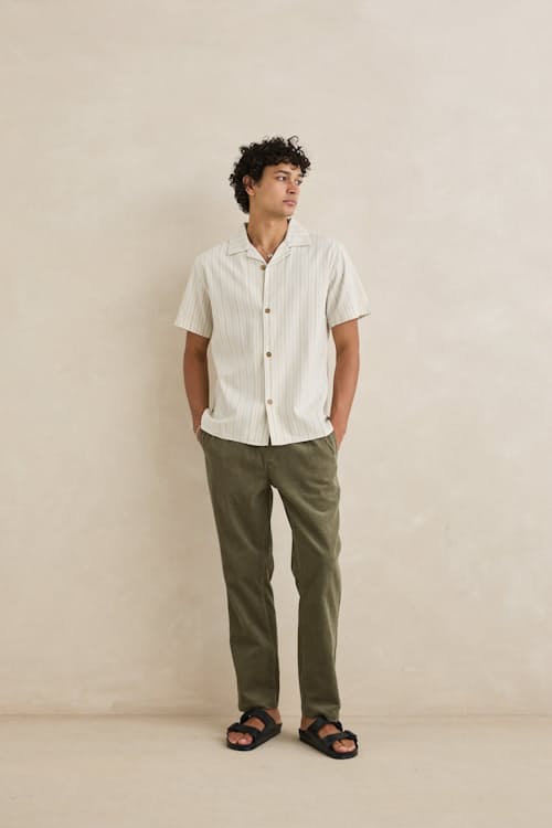 on model image of Vacation Stripe Short Sleeve Shirt