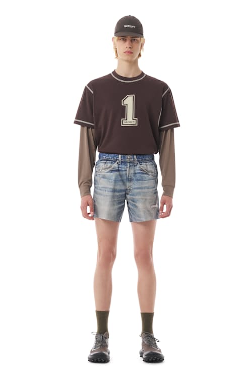 on model image of PeaceShell Unlined Short- 5"