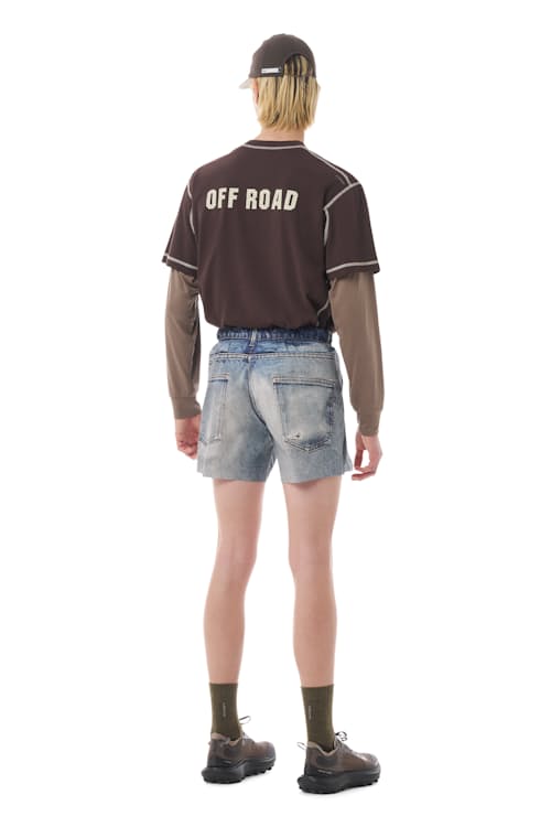 on model image of PeaceShell Unlined Short- 5"