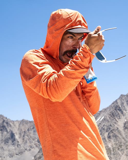 lifestyle image of Capilene Cool Sun Hoodie