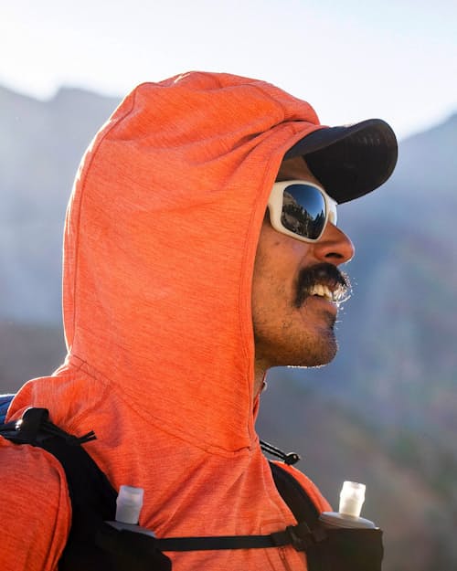 lifestyle image of Capilene Cool Sun Hoodie